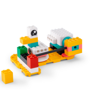 Teacher presenting a K–2 Coding Canvas lesson using projector in classroom